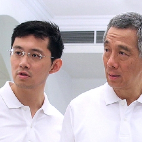 Prime Minister Lee Hsien Loong with his son Li Hongyi. Hongyi is now deputy director of the Government Digital Services Data Science Division of the Goverment Technology Agency of Singapore, a statutory board under the Prime Minister's office.